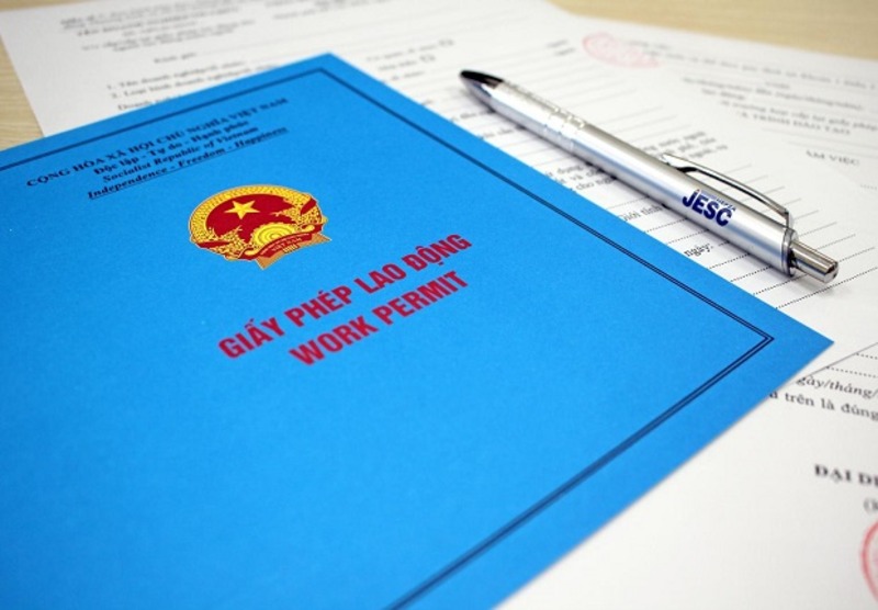Are foreign nationals married to Vietnamese citizens required to obtain a work permit?